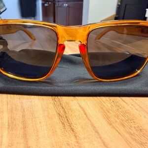 Oakley Orange Translucent Sunglasses with Dark Lenses